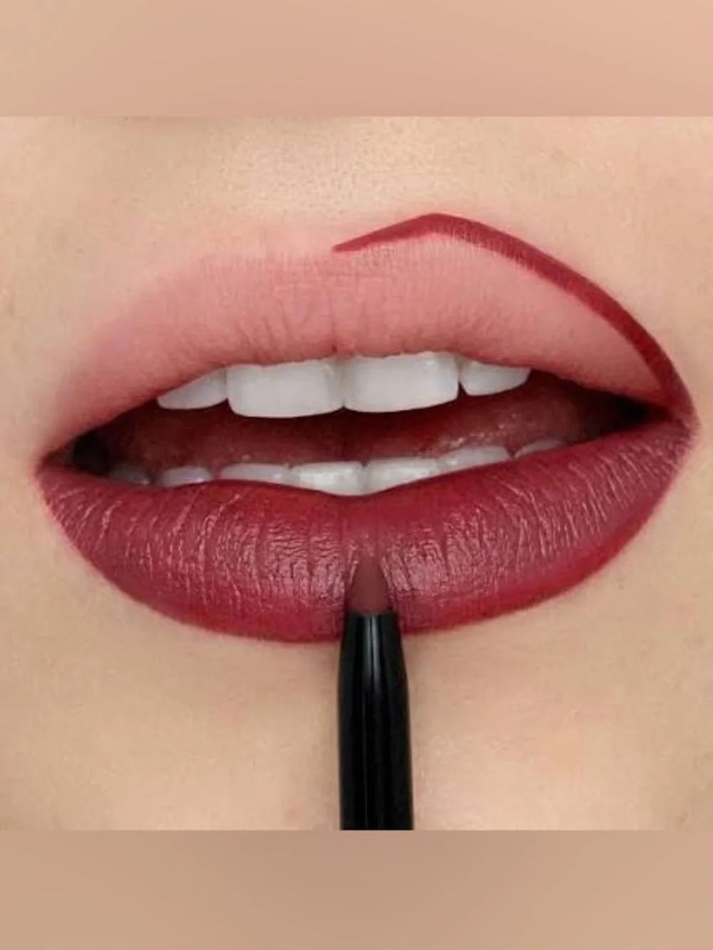 Lip flip liner with vitamins in brave Burgundy Red - long wear